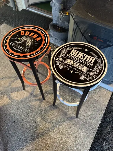 Round tables topped with custom printed graphics
